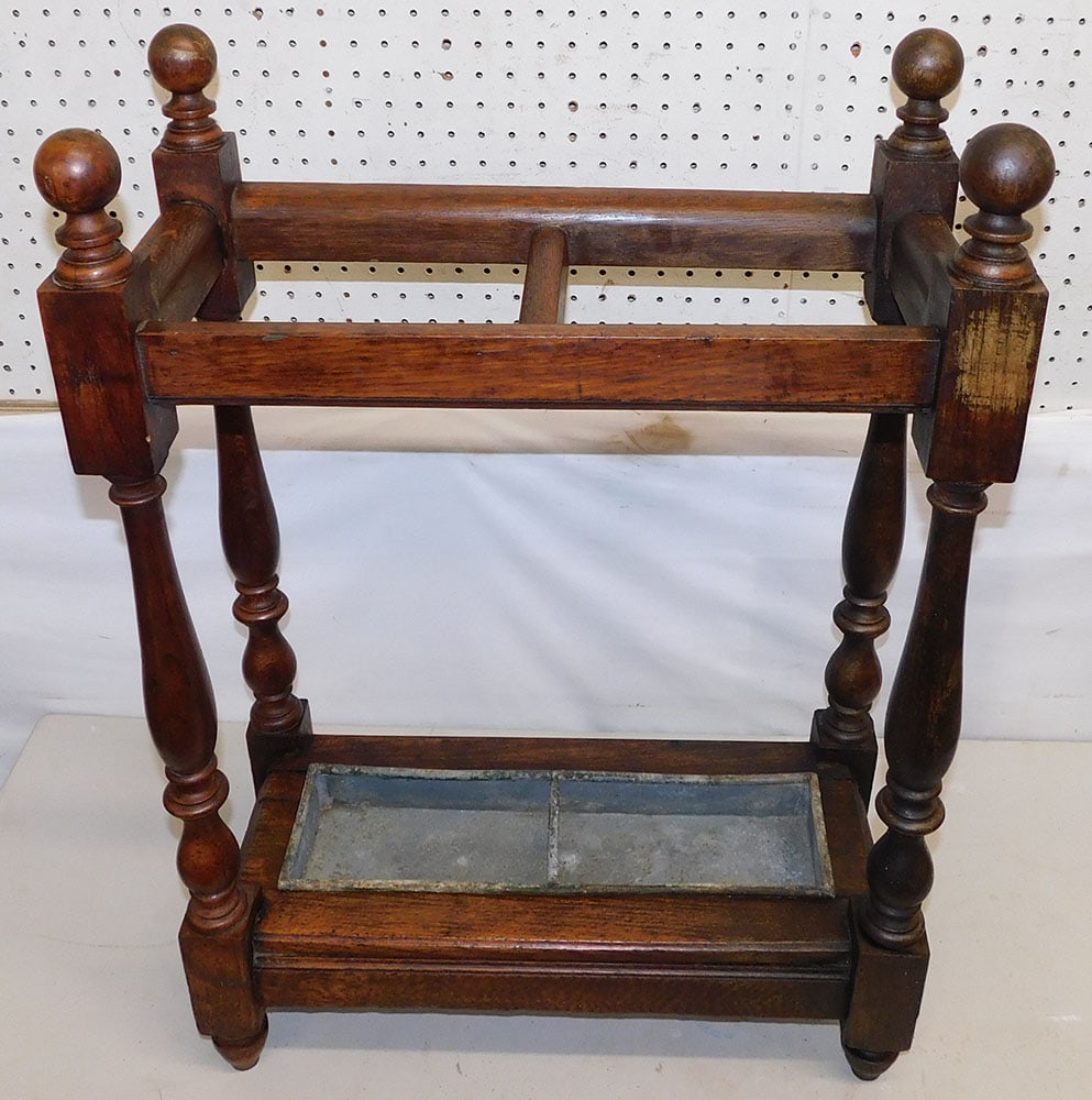 Antique Oak Umbrella Stand: Antique Oak Umbrella Stand. 22" W 10 1/2" D 31" H ALL DESCRIPTIONS AND ANY CONDITION STATEMENT GIVEN BY LANGSTON AUCTION GALLERY ARE STRICTLY OPINIONS AND LANGSTON'S SHALL HAVE NO RESPONSIBILITY FOR E