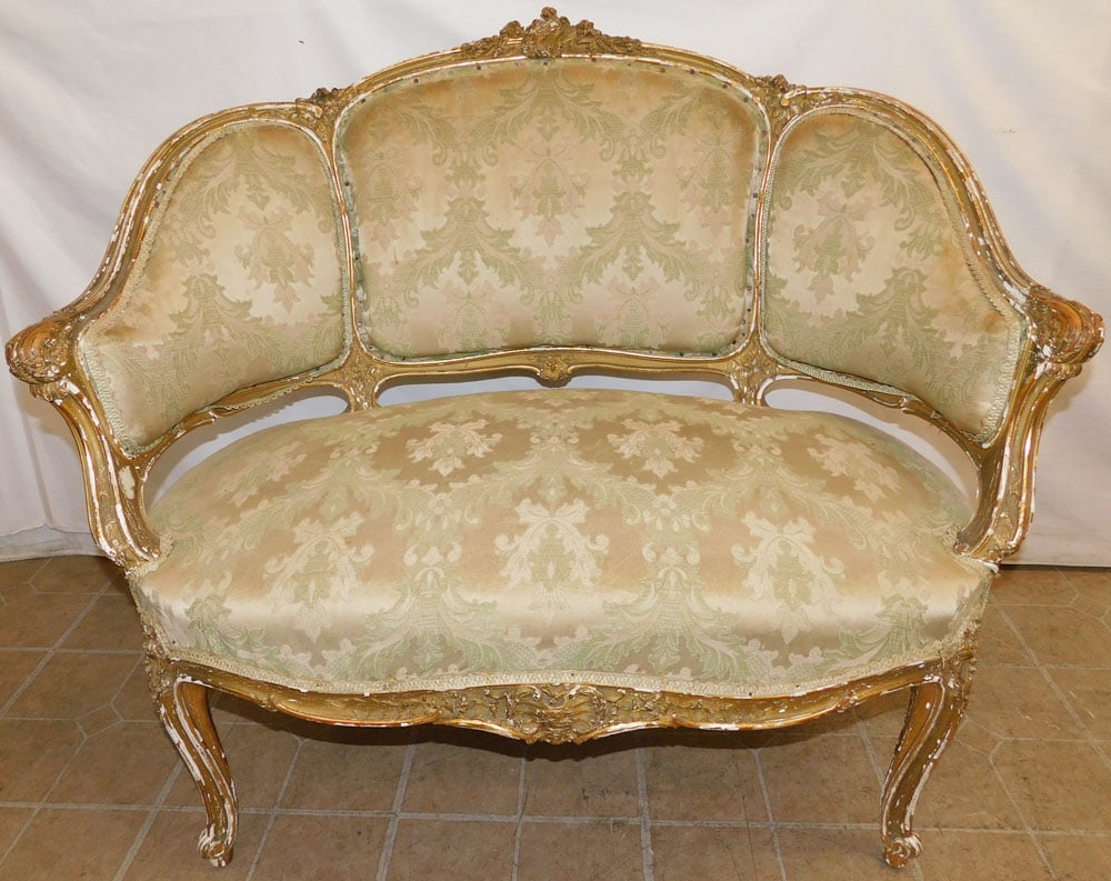 Antique Gilt Carved Wood & Upholstered French Loveseat: Antique Gilt Carved Wood & Upholstered French Loveseat. 39 1/2" W 37" H ALL DESCRIPTIONS AND ANY CONDITION STATEMENT GIVEN BY LANGSTON AUCTION GALLERY ARE STRICTLY OPINIONS AND LANGSTON'S SHALL HAVE N
