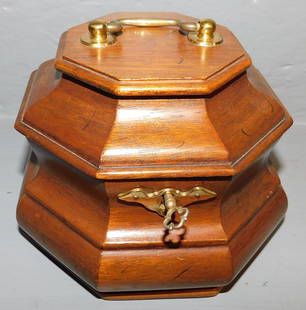 Mahogany Tea Caddy by Henkel Harris: Mahogany Tea Caddy by Henkel Harris. 6 1/2" Dia 5" H ALL DESCRIPTIONS AND ANY CONDITION STATEMENT GIVEN BY LANGSTON AUCTION GALLERY ARE STRICTLY OPINIONS AND LANGSTON'S SHALL HAVE NO RESPONSIBILITY FO