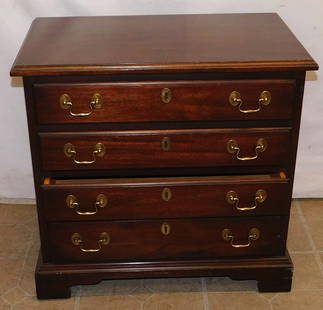 Mahogany Four Drawer Night Stand With Brass Carrying Handles By Henkel Harris: Mahogany Four Drawer Night Stand With Brass Carrying Handles By Henkel Harris. 24" W 14 1/2" D 22 3/4" H ALL DESCRIPTIONS AND ANY CONDITION STATEMENT GIVEN BY LANGSTON AUCTION GALLERY ARE STRICTLY OPI