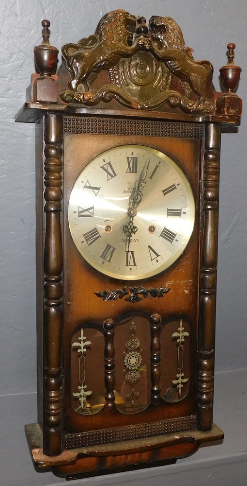 Sony Mahogany Wall Clock: Sony Mahogany Wall Clock . 12" W 27 1/2" H ALL DESCRIPTIONS AND ANY CONDITION STATEMENT GIVEN BY LANGSTON AUCTION GALLERY ARE STRICTLY OPINIONS AND LANGSTON'S SHALL HAVE NO RESPONSIBILITY FOR ERRORS O
