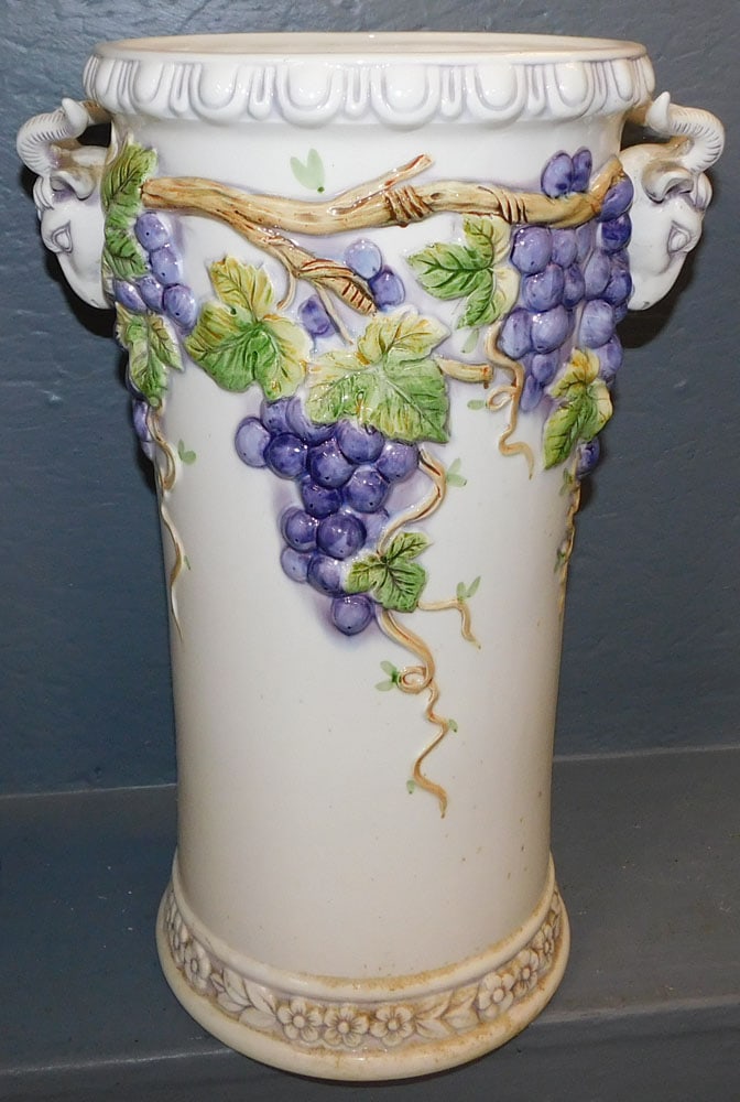 Painted Porcelain Rams Head Umbrella Stand: Painted Porcelain Rams Head Umbrella Stand. 18 1/4" H ALL DESCRIPTIONS AND ANY CONDITION STATEMENT GIVEN BY LANGSTON AUCTION GALLERY ARE STRICTLY OPINIONS AND LANGSTON'S SHALL HAVE NO RESPONSIBILITY F