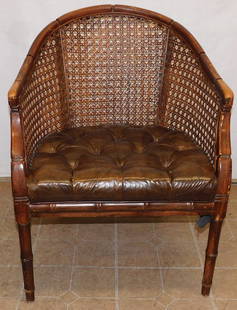 Faux Bamboo & Cane Back Arm Chair: Faux Bamboo & Cane Back Arm Chair . 32" H ALL DESCRIPTIONS AND ANY CONDITION STATEMENT GIVEN BY LANGSTON AUCTION GALLERY ARE STRICTLY OPINIONS AND LANGSTON'S SHALL HAVE NO RESPONSIBILITY FOR ERRORS OR