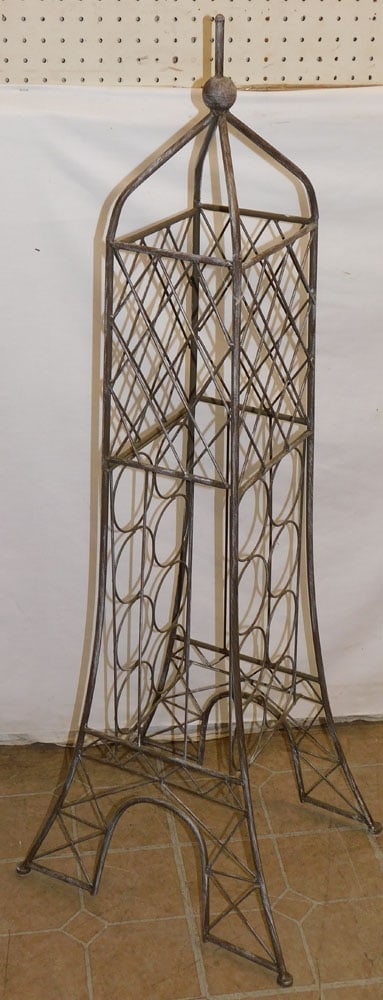 Metal Wine Rack: Metal Wine Rack. 47 1/2" H ALL DESCRIPTIONS AND ANY CONDITION STATEMENT GIVEN BY LANGSTON AUCTION GALLERY ARE STRICTLY OPINIONS AND LANGSTON'S SHALL HAVE NO RESPONSIBILITY FOR ERRORS OR OMISSIONS. THE