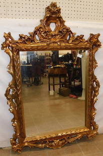 Ornate Gilded Frame Mirror: Ornate Gilded Frame Mirror . 32" X 48 1/2" ALL DESCRIPTIONS AND ANY CONDITION STATEMENT GIVEN BY LANGSTON AUCTION GALLERY ARE STRICTLY OPINIONS AND LANGSTON'S SHALL HAVE NO RESPONSIBILITY FOR ERRORS O