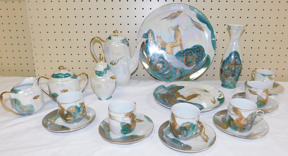 Hand Painted Porcelain Tea Set: Hand Painted Porcelain Tea Set. ALL DESCRIPTIONS AND ANY CONDITION STATEMENT GIVEN BY LANGSTON AUCTION GALLERY ARE STRICTLY OPINIONS AND LANGSTON'S SHALL HAVE NO RESPONSIBILITY FOR ERRORS OR OMISSIONS