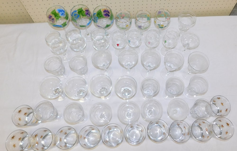 Lot Stemware: Lot Stemware. ALL DESCRIPTIONS AND ANY CONDITION STATEMENT GIVEN BY LANGSTON AUCTION GALLERY ARE STRICTLY OPINIONS AND LANGSTON'S SHALL HAVE NO RESPONSIBILITY FOR ERRORS OR OMISSIONS. THE ABSENCE OF A