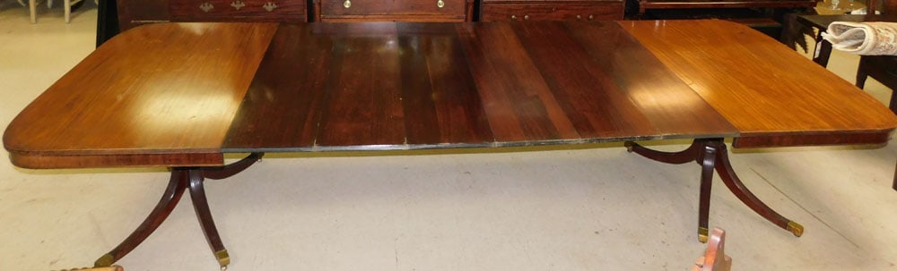 Mahogany Two Pedestal Dining Table With Six Leaves: Mahogany Two Pedestal Dining Table With Six Leaves. 143 1/2" L 54" D 29" H ALL DESCRIPTIONS AND ANY CONDITION STATEMENT GIVEN BY LANGSTON AUCTION GALLERY ARE STRICTLY OPINIONS AND LANGSTON'S SHALL HAV