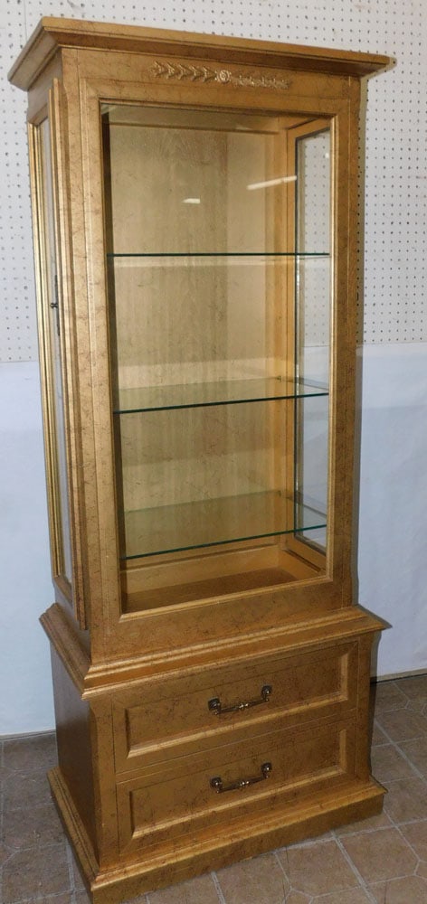 Gilt Paint Decorated Lighted Cabinet By Sanford: Gilt Paint Decorated Lighted Cabinet By Sanford. 28 1/2" W 16 1/4" D 68 1/4" H ALL DESCRIPTIONS AND ANY CONDITION STATEMENT GIVEN BY LANGSTON AUCTION GALLERY ARE STRICTLY OPINIONS AND LANGSTON'S SHALL