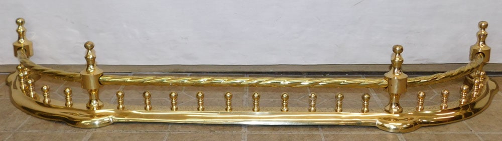 Brass Fireplace Fender: Brass Fireplace Fender. 48 1/2" W 6 1/2" H ALL DESCRIPTIONS AND ANY CONDITION STATEMENT GIVEN BY LANGSTON AUCTION GALLERY ARE STRICTLY OPINIONS AND LANGSTON'S SHALL HAVE NO RESPONSIBILITY FOR ERRORS O