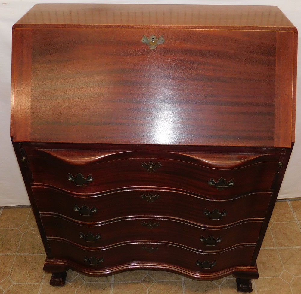 Mahogany Serpentine Front Desk by Skandia Furn. Co.: Mahogany Serpentine Front Desk by Skandia Furn. Co.. 32" W 17" D 41" H ALL DESCRIPTIONS AND ANY CONDITION STATEMENT GIVEN BY LANGSTON AUCTION GALLERY ARE STRICTLY OPINIONS AND LANGSTON'S SHALL HAVE NO