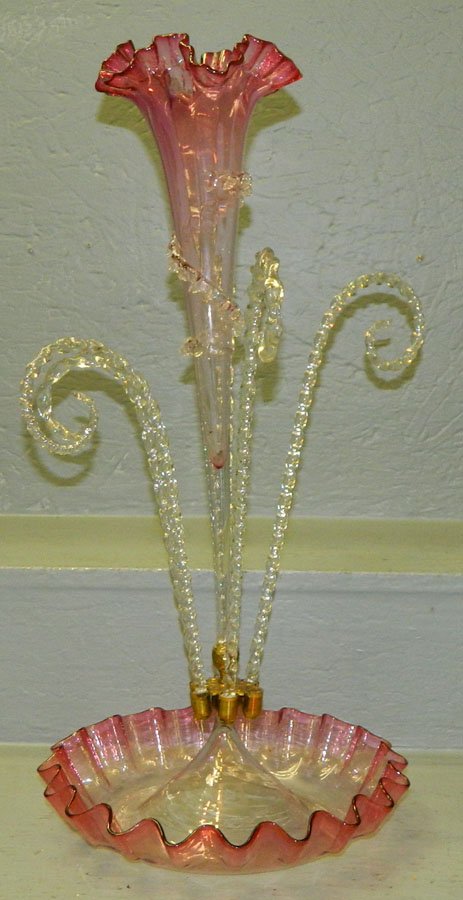 Cranberry and clear glass epergne. 21" tall.: Cranberry and clear glass epergne. One piece is missing. 21" tall.