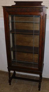 Antique Oak Cabinet With Leaded Glass Door: Antique Oak Cabinet With Leaded Glass Door. 22 1/4" W 10 1/2" D 52" H ALL DESCRIPTIONS AND ANY CONDITION STATEMENT GIVEN BY LANGSTON AUCTION GALLERY ARE STRICTLY OPINIONS AND LANGSTON'S SHALL HAVE