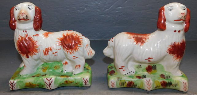 Pair Porcelain Spaniels: Pair Porcelain Spaniels. 4 3/4" H ALL DESCRIPTIONS AND ANY CONDITION STATEMENT GIVEN BY LANGSTON AUCTION GALLERY ARE STRICTLY OPINIONS AND LANGSTON'S SHALL HAVE NO RESPONSIBILITY FOR ERRORS OR