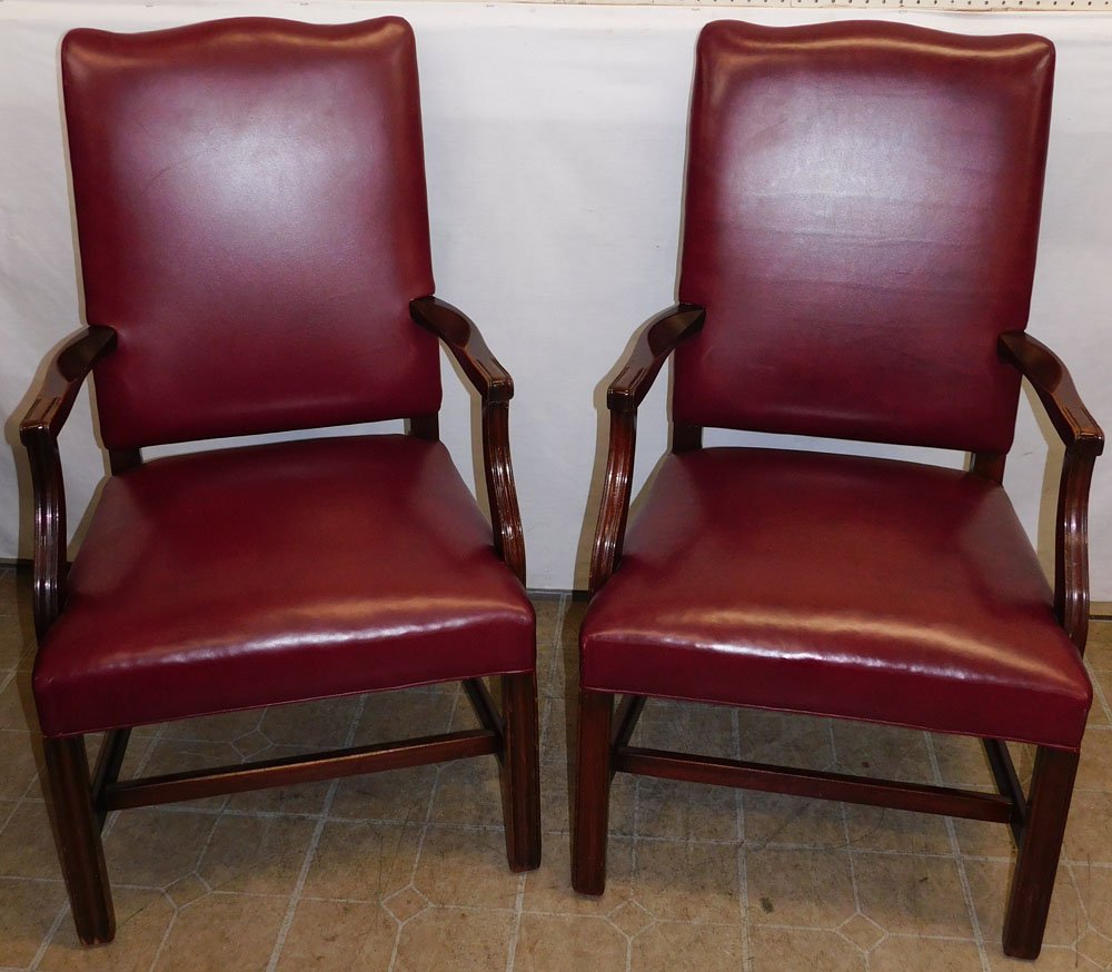 Pair of Leather & Mahogany Arm Chairs by Southwood: Pair of Leather & Mahogany Arm Chairs by Southwood. 42 1/2" H ALL DESCRIPTIONS AND ANY CONDITION STATEMENT GIVEN BY LANGSTON AUCTION GALLERY ARE STRICTLY OPINIONS AND LANGSTON'S SHALL HAVE NO RESPONSI