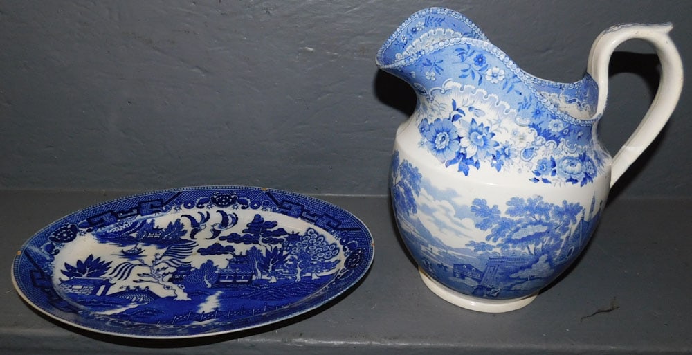 Blue Transfer Pitcher & Blue Willow Platter: Blue Transfer Pitcher & Blue Willow Platter. Up to 9" H ALL DESCRIPTIONS AND ANY CONDITION STATEMENT GIVEN BY LANGSTON AUCTION GALLERY ARE STRICTLY OPINIONS AND LANGSTON'S SHALL HAVE NO RESPONSIBILITY