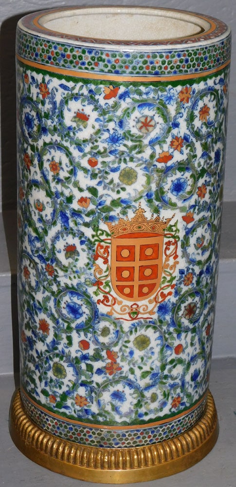 Oriental Crackle Porcelain Coat of Arms Umbrella Stand On Original Signed Bronze Base: Oriental Crackle Porcelain Coat of Arms Umbrella Stand On Original Signed Bronze Base. 19 3/4" H ALL DESCRIPTIONS AND ANY CONDITION STATEMENT GIVEN BY LANGSTON AUCTION GALLERY ARE STRICTLY OPINIONS AN