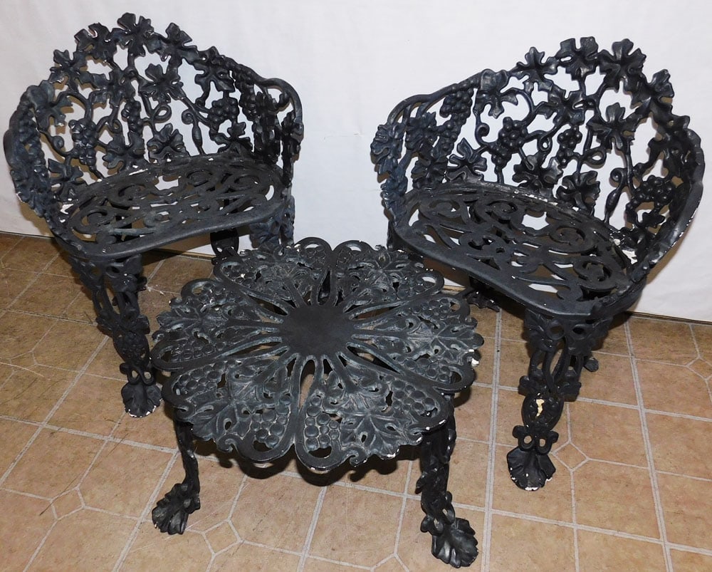 Pair of Painted Cast Aluminum Chairs & Table: Pair of Painted Cast Aluminum Chairs & Table. 26 1/4" H ALL DESCRIPTIONS AND ANY CONDITION STATEMENT GIVEN BY LANGSTON AUCTION GALLERY ARE STRICTLY OPINIONS AND LANGSTON'S SHALL HAVE NO RESPONSIBILITY