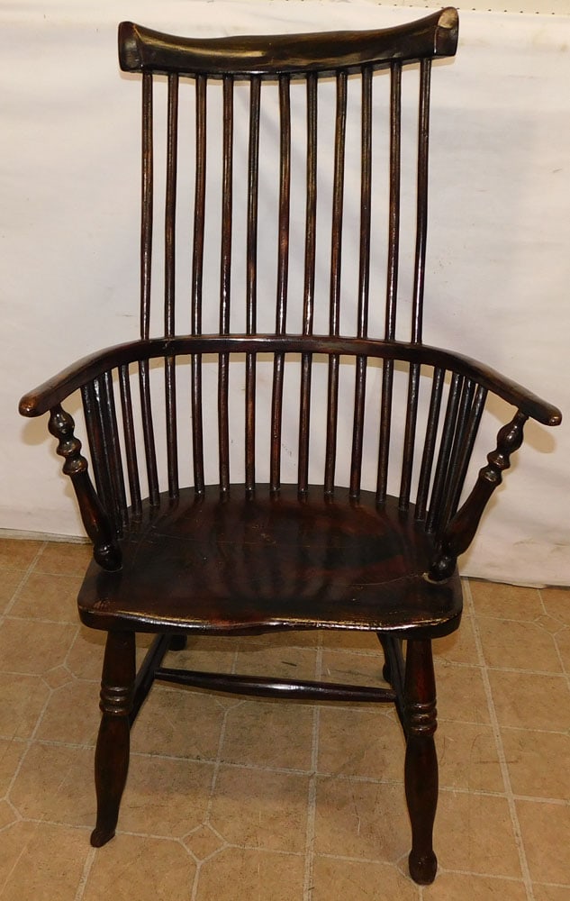 19th Century Elmwood Windsor Arm Chair: 19th Century Elmwood Windsor Arm Chair. 43" H ALL DESCRIPTIONS AND ANY CONDITION STATEMENT GIVEN BY LANGSTON AUCTION GALLERY ARE STRICTLY OPINIONS AND LANGSTON'S SHALL HAVE NO RESPONSIBILITY FOR ERROR