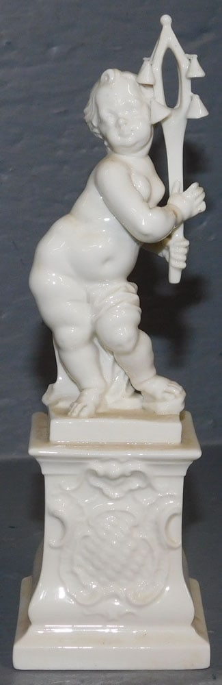 Dresden Style Porcelain Figure: Dresden Style Porcelain Figure. 7" H ALL DESCRIPTIONS AND ANY CONDITION STATEMENT GIVEN BY LANGSTON AUCTION GALLERY ARE STRICTLY OPINIONS AND LANGSTON'S SHALL HAVE NO RESPONSIBILITY FOR ERRORS OR OMIS