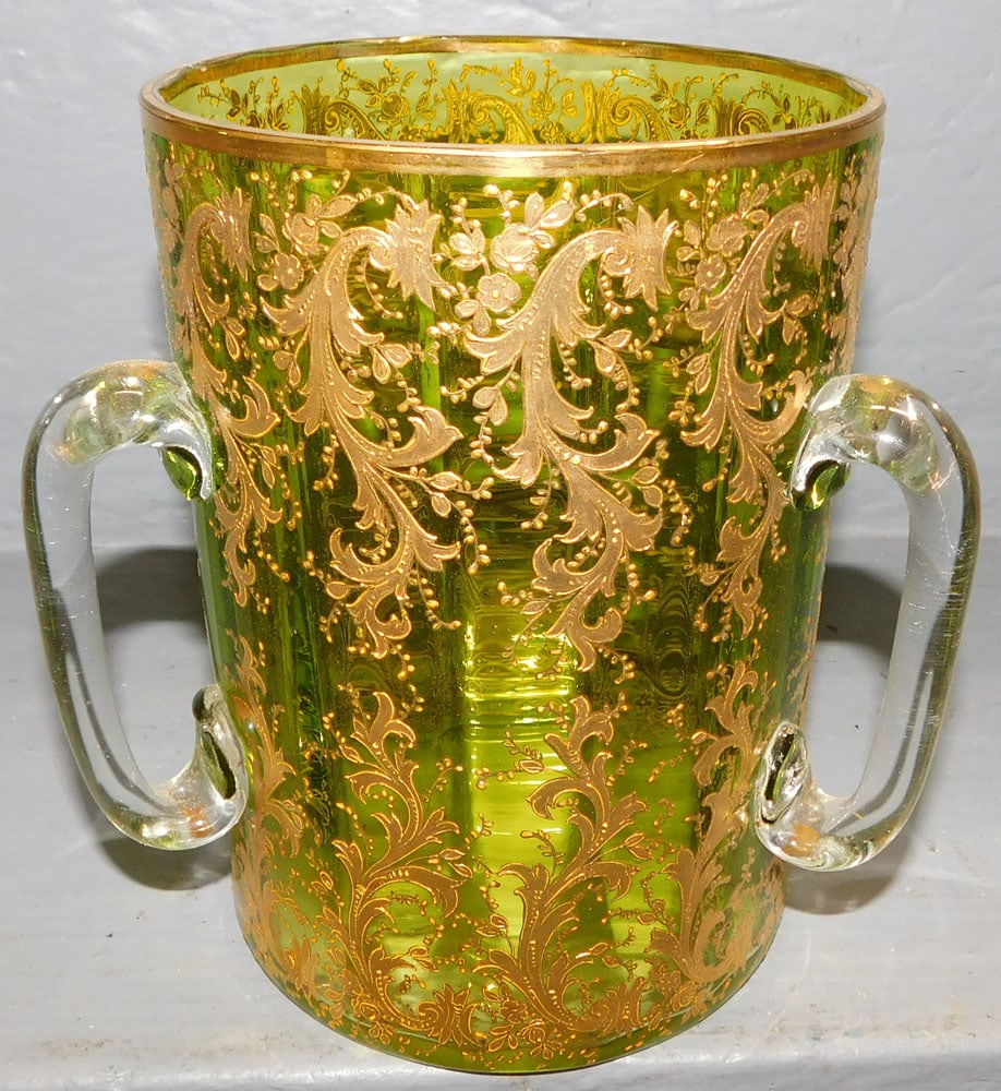 Art Glass Loving Cup With Gold Accents: Art Glass Loving Cup With Gold Accents. 6 3/4" H ALL DESCRIPTIONS AND ANY CONDITION STATEMENT GIVEN BY LANGSTON AUCTION GALLERY ARE STRICTLY OPINIONS AND LANGSTON'S SHALL HAVE NO RESPONSIBILITY FOR ER