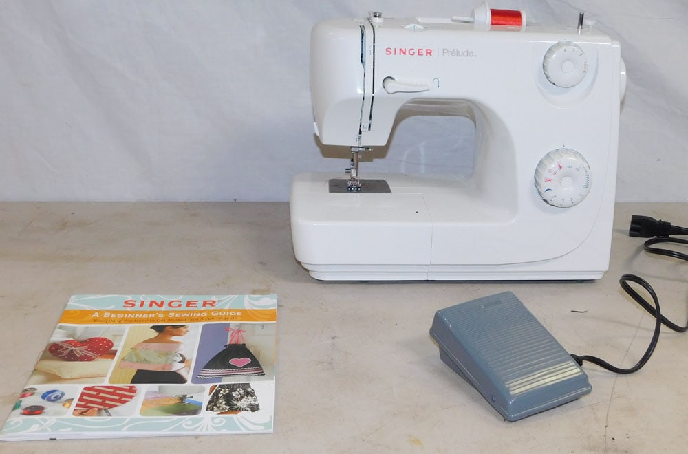 Singer Sewing Machine: Singer Sewing Machine. ALL DESCRIPTIONS AND ANY CONDITION STATEMENT GIVEN BY LANGSTON AUCTION GALLERY ARE STRICTLY OPINIONS AND LANGSTON'S SHALL HAVE NO RESPONSIBILITY FOR ERRORS OR OMISSIONS. THE ABS