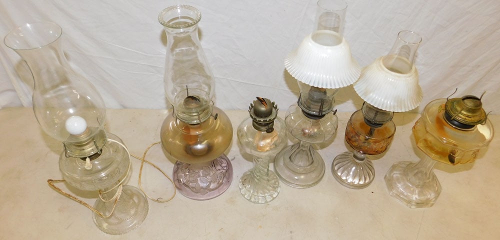 Lot Oil Lamps: Lot Oil Lamps. ALL DESCRIPTIONS AND ANY CONDITION STATEMENT GIVEN BY LANGSTON AUCTION GALLERY ARE STRICTLY OPINIONS AND LANGSTON'S SHALL HAVE NO RESPONSIBILITY FOR ERRORS OR OMISSIONS. THE ABSENCE OF 
