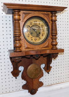 Victorian Walnut Wall Clock: Victorian Walnut Wall Clock. 16" W 26" H ALL DESCRIPTIONS AND ANY CONDITION STATEMENT GIVEN BY LANGSTON AUCTION GALLERY ARE STRICTLY OPINIONS AND LANGSTON'S SHALL HAVE NO RESPONSIBILITY FOR ERRORS OR