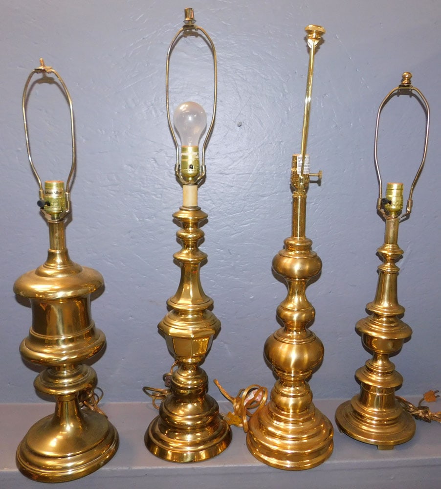 Lot Four Brass Lamps: Lot Four Brass Lamps. Up to 32 1/2" H ALL DESCRIPTIONS AND ANY CONDITION STATEMENT GIVEN BY LANGSTON AUCTION GALLERY ARE STRICTLY OPINIONS AND LANGSTON'S SHALL HAVE NO RESPONSIBILITY FOR ERRORS OR OMI