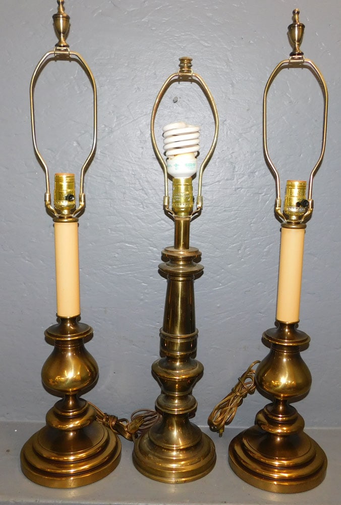 Three Gilt Metal Lamps: Three Gilt Metal Lamps. Up to 30 1/4" H ALL DESCRIPTIONS AND ANY CONDITION STATEMENT GIVEN BY LANGSTON AUCTION GALLERY ARE STRICTLY OPINIONS AND LANGSTON'S SHALL HAVE NO RESPONSIBILITY FOR ERRORS OR O