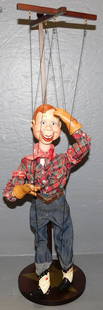 Howdie Doodie Puppet On Stand: Howdie Doodie Puppet On Stand. 24" H ALL DESCRIPTIONS AND ANY CONDITION STATEMENT GIVEN BY LANGSTON AUCTION GALLERY ARE STRICTLY OPINIONS AND LANGSTON'S SHALL HAVE NO RESPONSIBILITY FOR ERRORS OR OMIS