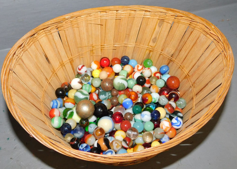 Lot Antique Marbles In Bamboo Basket: Lot Antique Marbles In Bamboo Basket. ALL DESCRIPTIONS AND ANY CONDITION STATEMENT GIVEN BY LANGSTON AUCTION GALLERY ARE STRICTLY OPINIONS AND LANGSTON'S SHALL HAVE NO RESPONSIBILITY FOR ERRORS OR OMI