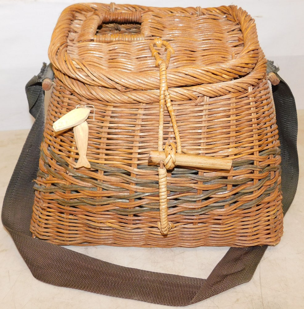 Wicker Fishing Basket: Wicker Fishing Basket. 15" W 10 1/2" D 13 1/2" H ALL DESCRIPTIONS AND ANY CONDITION STATEMENT GIVEN BY LANGSTON AUCTION GALLERY ARE STRICTLY OPINIONS AND LANGSTON'S SHALL HAVE NO RESPONSIBILITY FOR ER