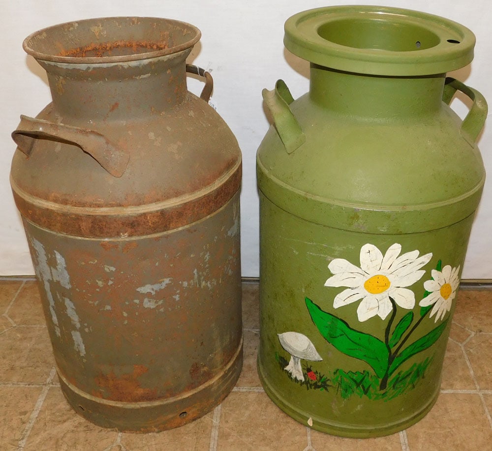 Two Antique Milk Cans: Two Antique Milk Cans. Up to 26" H ALL DESCRIPTIONS AND ANY CONDITION STATEMENT GIVEN BY LANGSTON AUCTION GALLERY ARE STRICTLY OPINIONS AND LANGSTON'S SHALL HAVE NO RESPONSIBILITY FOR ERRORS OR OMISSI