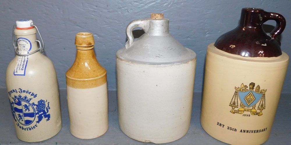 Lot Stone Ware Liquor Jugs & Bottles: Lot Stone Ware Liquor Jugs & Bottles. Up to 9 1/2" H ALL DESCRIPTIONS AND ANY CONDITION STATEMENT GIVEN BY LANGSTON AUCTION GALLERY ARE STRICTLY OPINIONS AND LANGSTON'S SHALL HAVE NO RESPONSIBILITY FO