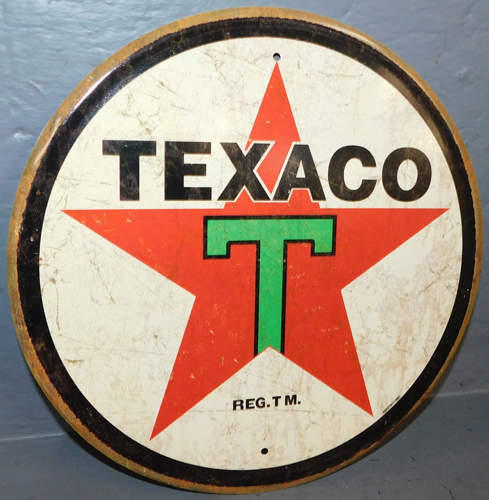 Texaco Sign: Texaco Sign. 11 1/2" Dia. ALL DESCRIPTIONS AND ANY CONDITION STATEMENT GIVEN BY LANGSTON AUCTION GALLERY ARE STRICTLY OPINIONS AND LANGSTON'S SHALL HAVE NO RESPONSIBILITY FOR ERRORS OR OMISSIONS. THE 