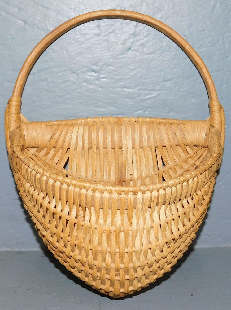 Split Oak Wall Basket: Split Oak Wall Basket. 10 1/4" x 12 1/2" ALL DESCRIPTIONS AND ANY CONDITION STATEMENT GIVEN BY LANGSTON AUCTION GALLERY ARE STRICTLY OPINIONS AND LANGSTON'S SHALL HAVE NO RESPONSIBILITY FOR ERRORS OR 