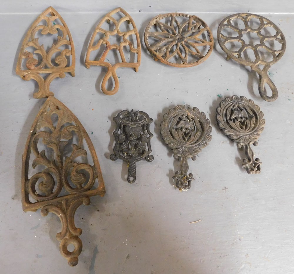 Lot of Cast Iron Trivets (1 of 2)
