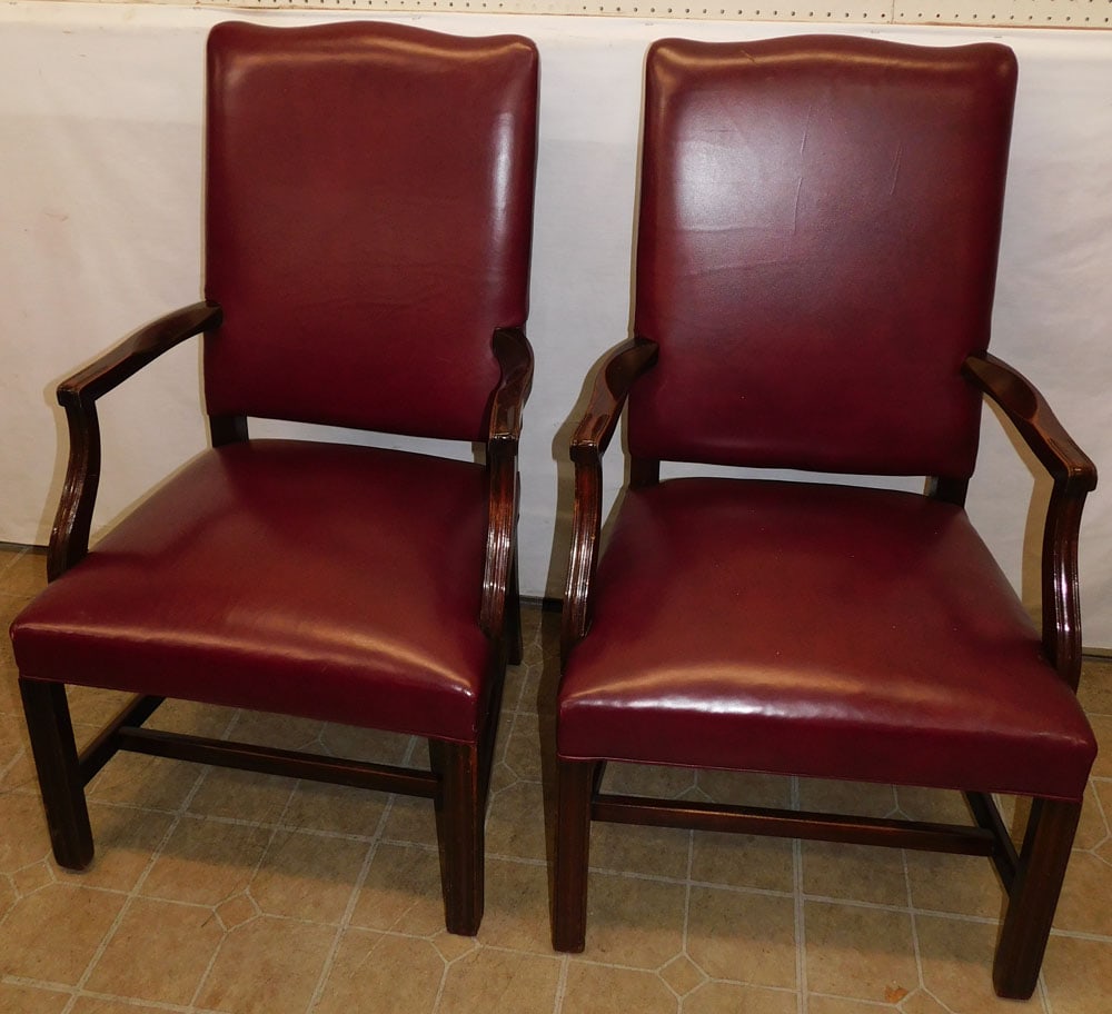 Pair of Leather Upholstered & Mahogany Arm Chairs by Southwood: Pair of Leather Upholstered & Mahogany Arm Chairs by Southwood. 43" H ALL DESCRIPTIONS AND ANY CONDITION STATEMENT GIVEN BY LANGSTON AUCTION GALLERY ARE STRICTLY OPINIONS AND LANGSTON'S SHALL HAVE NO 