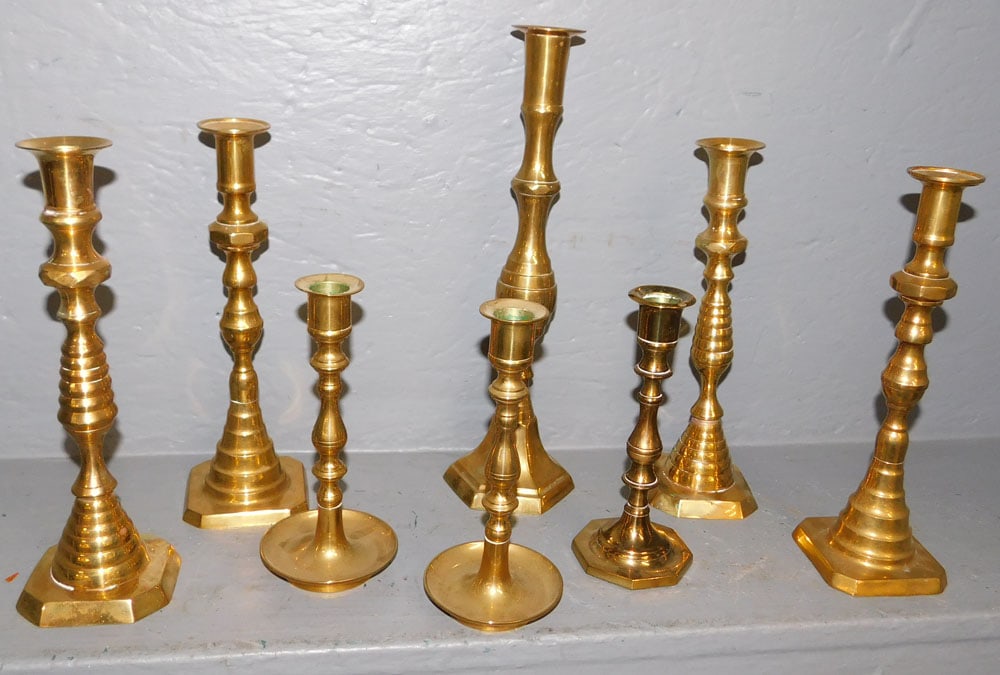 Lot of Brass Candlesticks: Lot of Brass Candlesticks. 13" H ALL DESCRIPTIONS AND ANY CONDITION STATEMENT GIVEN BY LANGSTON AUCTION GALLERY ARE STRICTLY OPINIONS AND LANGSTON'S SHALL HAVE NO RESPONSIBILITY FOR ERRORS OR OMISSION