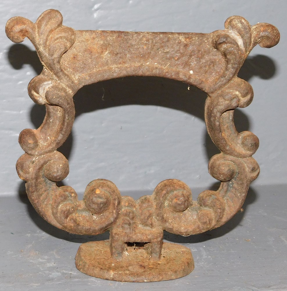 Cast Iron Boot Scraper: Cast Iron Boot Scraper. 7" H ALL DESCRIPTIONS AND ANY CONDITION STATEMENT GIVEN BY LANGSTON AUCTION GALLERY ARE STRICTLY OPINIONS AND LANGSTON'S SHALL HAVE NO RESPONSIBILITY FOR ERRORS OR OMISSIONS. T