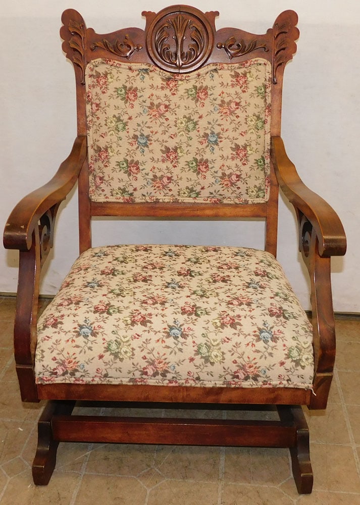 Carved Mahogany Victorian Rocking Arm Chair: Carved Mahogany Victorian Rocking Arm Chair. 37" H ALL DESCRIPTIONS AND ANY CONDITION STATEMENT GIVEN BY LANGSTON AUCTION GALLERY ARE STRICTLY OPINIONS AND LANGSTON'S SHALL HAVE NO RESPONSIBILITY FOR 