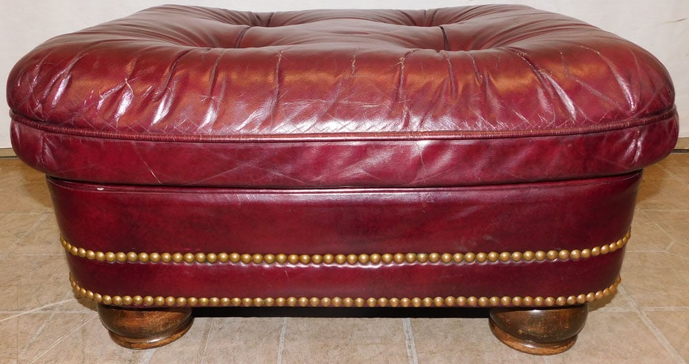 Leather Ottoman: Leather Ottoman. 27" W 22" D 14" H ALL DESCRIPTIONS AND ANY CONDITION STATEMENT GIVEN BY LANGSTON AUCTION GALLERY ARE STRICTLY OPINIONS AND LANGSTON'S SHALL HAVE NO RESPONSIBILITY FOR ERRORS OR OMISSI