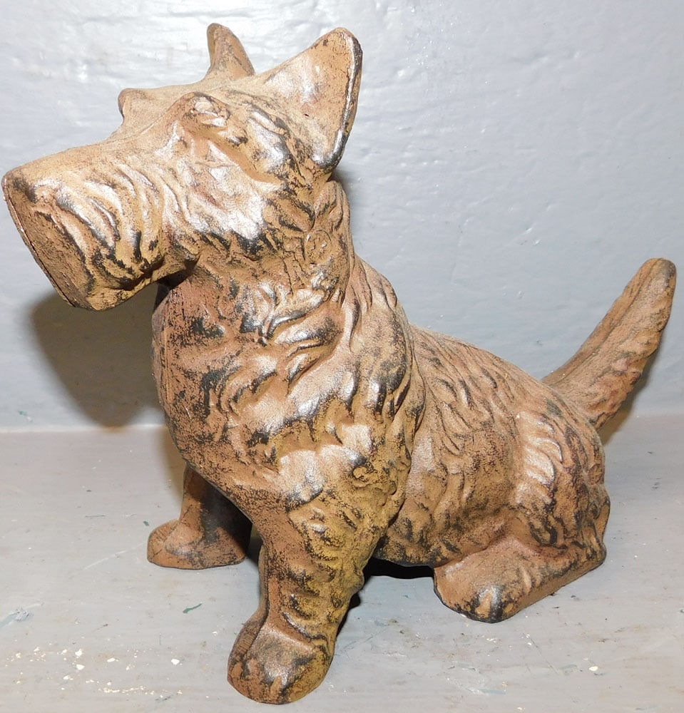 Cast Iron Terrier Door Stop: Cast Iron Terrier Door Stop. 11" W 7" H ALL DESCRIPTIONS AND ANY CONDITION STATEMENT GIVEN BY LANGSTON AUCTION GALLERY ARE STRICTLY OPINIONS AND LANGSTON'S SHALL HAVE NO RESPONSIBILITY FOR ERRORS OR O