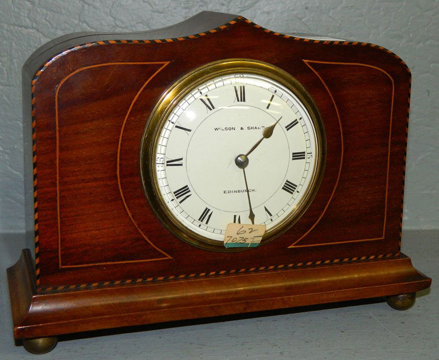 8 day Wilson & Sharp mahogany inlaid clock.: Eight day mahogany inlaid porcelain dial clock with platform escapement. Signed Wilson and Sharp, Edinburgh. 9" x 7".