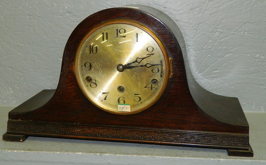 Multiple chiming 8 day German clock.: Multiple chiming eight day German clock with silent chime controls. 16 1/2" x 9 1/2".