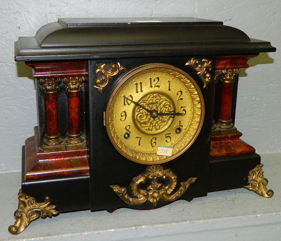 Ingraham 8 day mantle clock w/cathedral gong.: Ingraham eight day four column painted mantle clock with brass detailing and cathedral gong. 16" x 11".