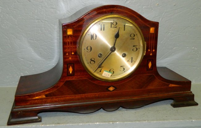 Inlaid mahogany 8 day mantle clock w/columns.