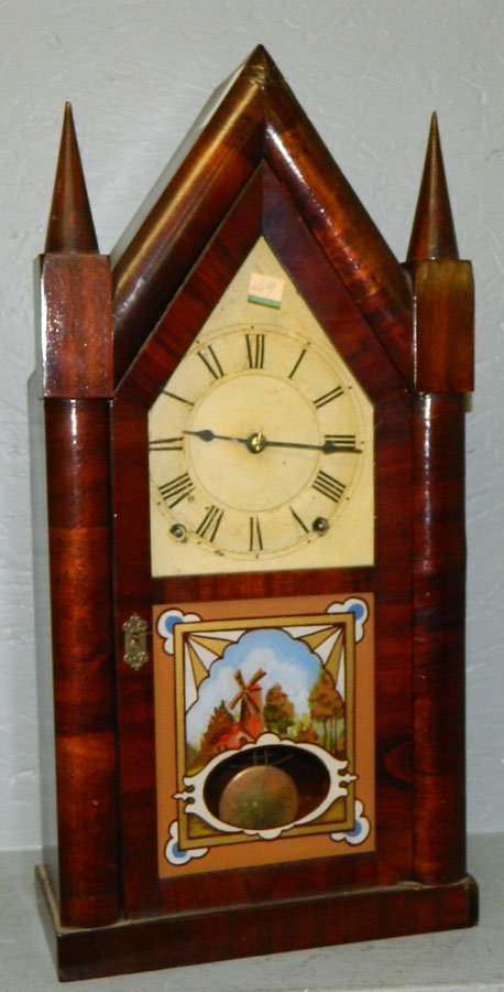 American Steeple 8 day clock w/windmill detail.: American Steeple eight day pendulum clock with windmill detail and ogee door. Signed Terry and Andrews, 1842. 9 3/4" x 20".