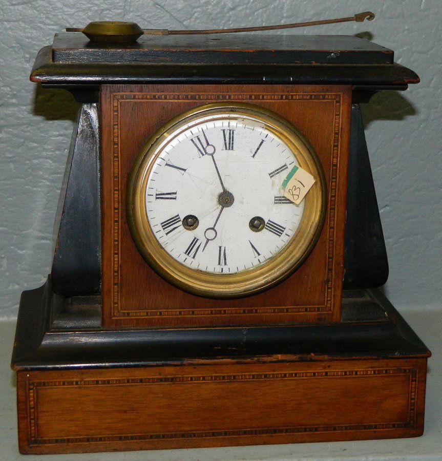 Mahogany front French 8 day shelf clock.: Mahogany front French eight day shelf clock with porcelain dial. 9 1/4" x 8 3/4".